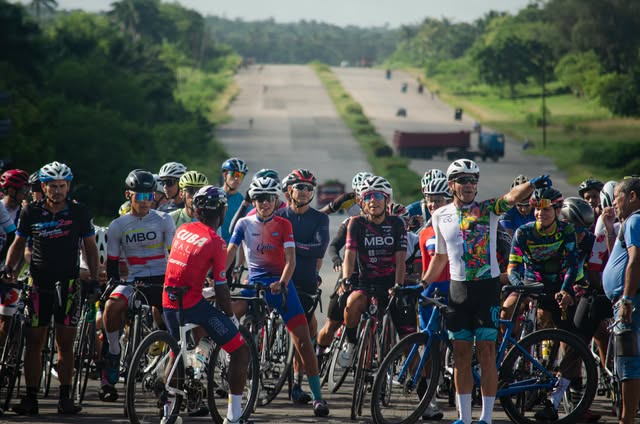 Large group of cyclists gathered before a ride