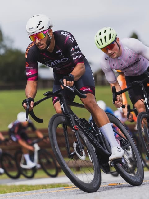 MBO rider cornering in a road race